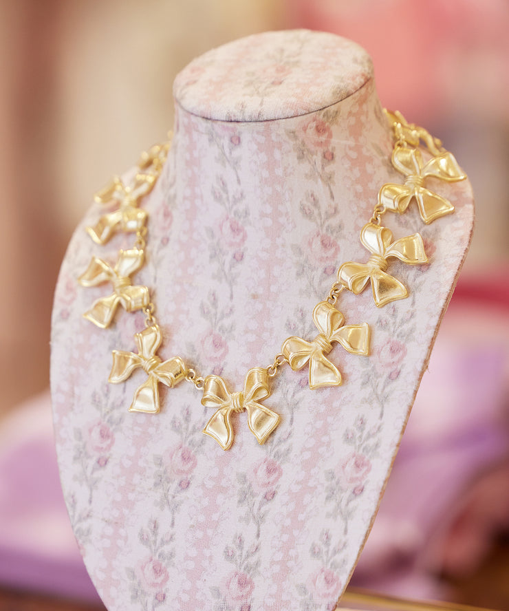 Golden Garland Bow Necklace